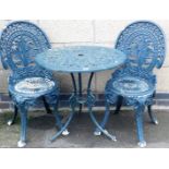 A metal two piece garden bistro set, painted in green.