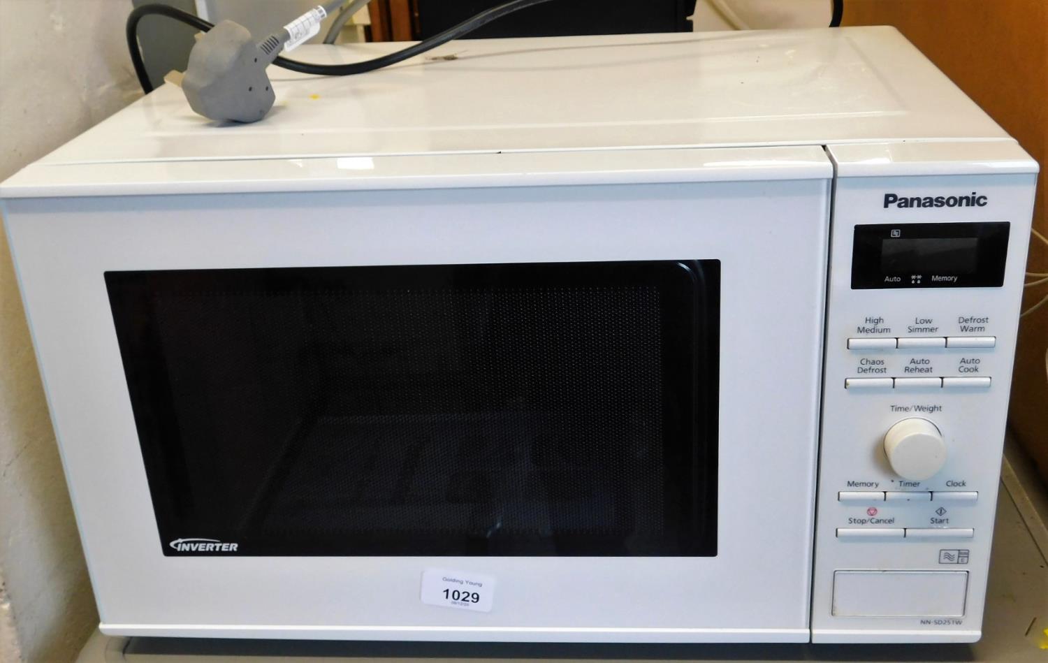 A Panasonic Inverter microwave, NN-SD251W, in white, with instruction manual.