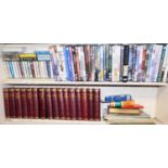 A group of tapes, DVDs and books, to include leather bound Dickens, mini Dictionaries, tapes and