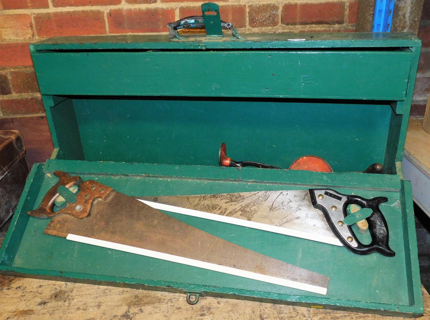 A green painted pine tool box and contents, to include two hand saws, a Goodell Pratt Co dye,