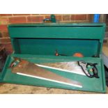 A green painted pine tool box and contents, to include two hand saws, a Goodell Pratt Co dye,