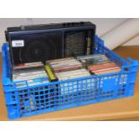 A Grundic Music Boy radio, and various music cassettes, to include Stephen Grappelli, etc. (a