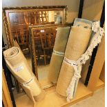 Two gilt framed wall mirrors and two modern rugs.