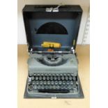 A vintage Imperial The Good Companion typewriter in fitted case.