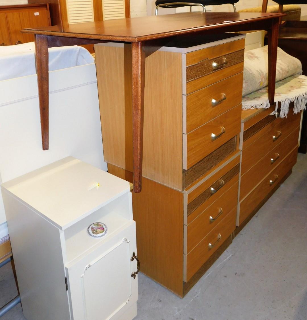 A group of furniture to include a French style bed surround, a chest of three drawers, with matching