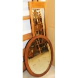 An oak framed oval wall mirror and a rectangular wooden framed wall mirror (2).