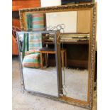 Two modern wall mirrors, to include a large gilt framed fern leaf mirror, in the rococo style, 132cm