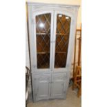 An Old Charm style grey painted corner display cabinet, with glazed top and two cupboard base, 167cm