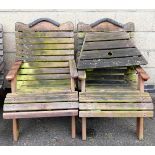 A pair of wooden garden chairs, with central table joining section.