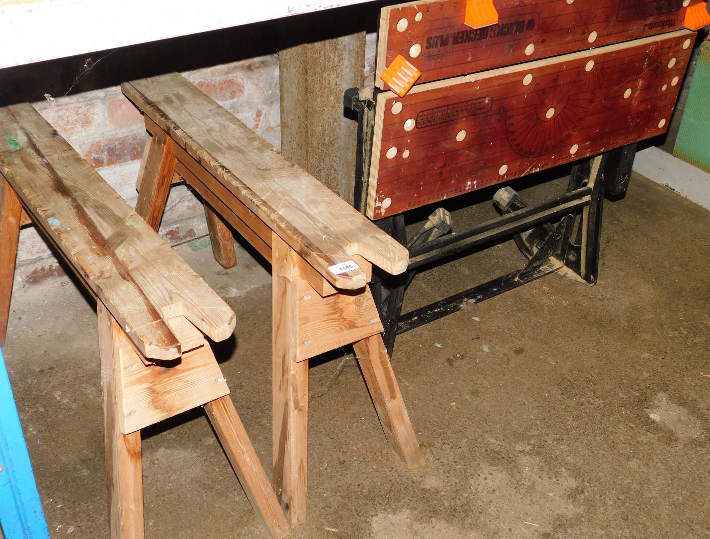 A Black and Decker work mate two and two wooden workbench stands. (3)