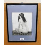 After R F Key. Nude lady, in black frame.