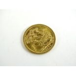 An Elizabeth II full gold sovereign 1966, 8.0g.