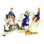 A collection of five Staffordshire pottery figure groups, to include a lady with a cot and baby,