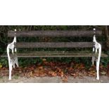 A slatted cast iron garden bench, with Gothic style end supports, decorated with leaves, etc., 190cm