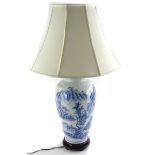 A modern Chinese blue and white glazed decorated table lamp, with shade 75cm high.