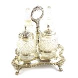 A William IV silver four bottle cruet, with cut glass, comprising two bottles and stoppers, (AF),