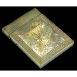 A Victorian carved mother of pearl card case, decorated in relief with a bird bath, scrolls,