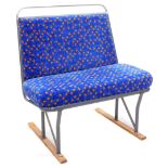 A chrome plated and upholstered bus seat, 76cm wide.