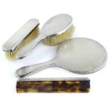 A silver mounted four piece dressing table set, engraved to the larger brush Dearest Pegs, My