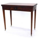 A 19thC mahogany tea table, with a rectangular folding top above a small checker banded drawer, on