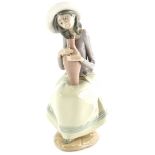 A Nao porcelain figure, Girl with Flagons, model number 02001360, 28cm high.