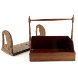 A mahogany portable book stand or book carrier, with turned handle, 28cm wide, and an adjustable