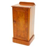 A Victorian walnut and burr walnut pot cupboard, with a raised gallery above a panelled door with