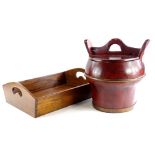 An oriental stained wooden food carrier, 32cm wide, and a mahogany galleried tray, 46cm wide.