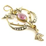 A silver gilt Art Nouveau pendant, set with faux pearl and pink paste stone, in rub over setting, (