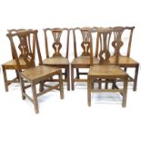 A harlequin set of six 19thC oak dining chairs, each with a pierced vase shaped splat and a solid