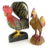 A later 20th/early 21stC carved wooden cockerel, and a similar chicken, the cockerel, 53cm high.