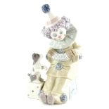 A Lladro porcelain model, Pierrot with concertina, model 01005279, issued 1985.