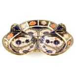 A Royal Crown Derby porcelain trefoil shaped hors d'ouvres dish, decorated with the 1128 Imari