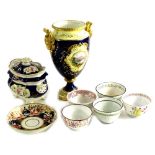 A collection of mainly 19thC ceramics, to include a Coalport two handled urn, painted with a lake