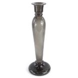 A large slender grey art glass vase, of baluster form, on a domed foot, 46cm high.