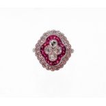 A Victorian style ruby and diamond cluster ring, with four central round brilliant cut diamonds,