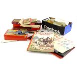 A quantity of late 19th/early 20thC and later vintage board games, playing cards, etc.