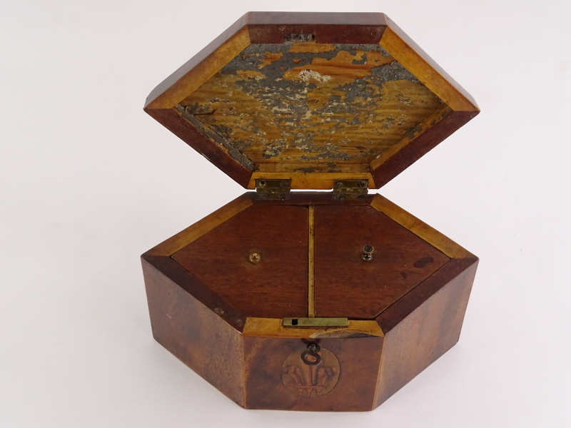 A George III mahogany and boxwood strung tea caddy, of elongated hexagonal form, the hinged lid with - Image 3 of 3