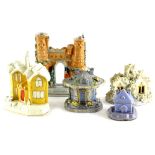 Five Staffordshire cottages, to include a yellow ground pastille burner applied with a dog and a