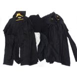 A collection of lawyers or barrister's robes, one labelled Ede and Ravencroft.