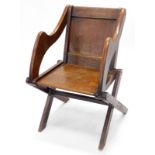 A late 19thC oak Glastonbury type chair, of plain form. (AF)