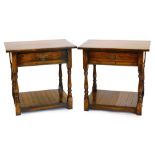 A pair of oak occasional tables, each with a rectangular top, above a frieze drawer, on turned