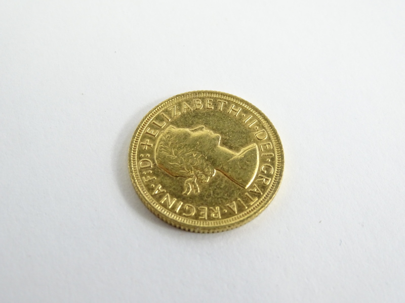 An Elizabeth II full gold sovereign 1964, 8.0g. - Image 2 of 2