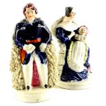 A pair of 19thC Staffordshire figures, Queen Victoria and Prince Albert seated with a baby, 14cm