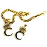 A 9ct gold bracelet and pendant set, the bracelet with curb links and initial C with crown and