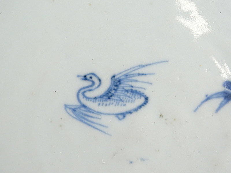 A Chinese export blue and white plate, decorated with geese, bamboo and a terrace, in blue within - Image 2 of 4