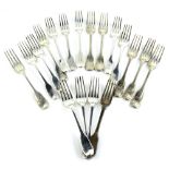 An associated set of 19thC silver fiddle pattern dessert forks, each with an engraved handle, 25¾