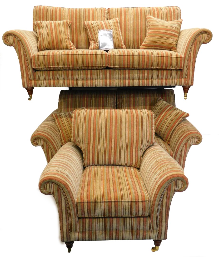 A Parker Knoll suite of furniture, each piece upholstered in striped fabric on turned legs with