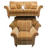 A Parker Knoll suite of furniture, each piece upholstered in striped fabric on turned legs with