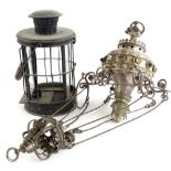 A late 19thC Gothic style hall lantern, with paraffin lamp attachment, inset with coloured glass